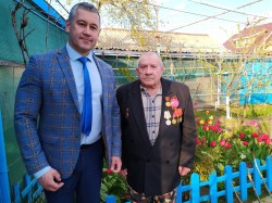 Округ 5 вручение подарков ветеранам